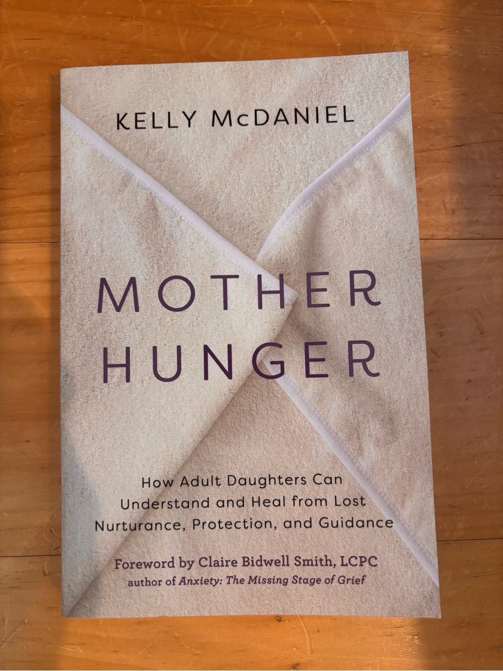 "Mother Hunger" Paperback Book - Cream Cover